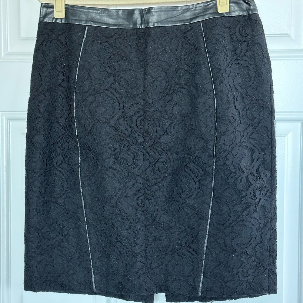 Black lace and leather accent mini skirt.